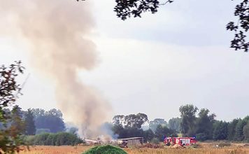 Płonie nielegalny obóz bezdomnych na działce koło Dąbia (ZDJĘCIA CZYTELNIKA)